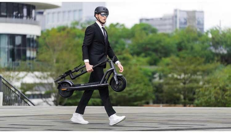 Patinete Eléctrico Adultos NAVEE N65i, Autonomía 65km, Máxima 25 km/h, Motor 1000W, Absorción Cuádruple Choques,24% Inclinación, Neumáticos Tubeless de 10,5”, IPX5, Flexible